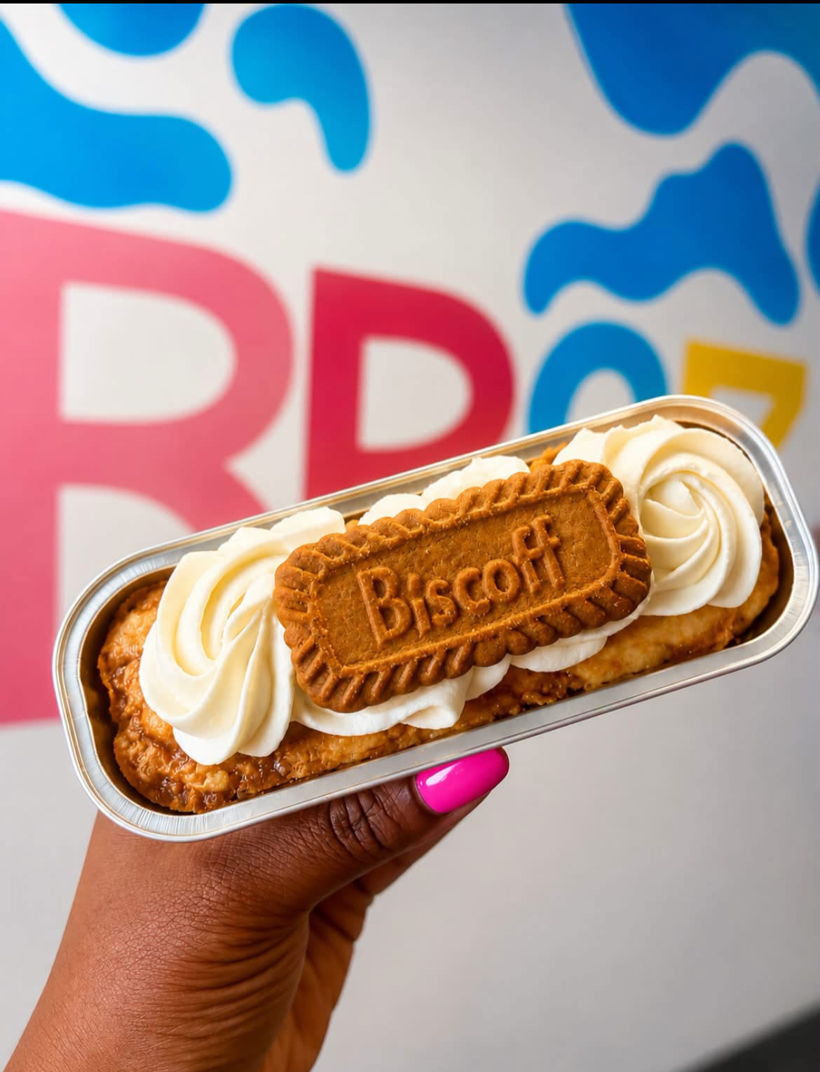 Biscoff dessert bar topped with buttercream swirls